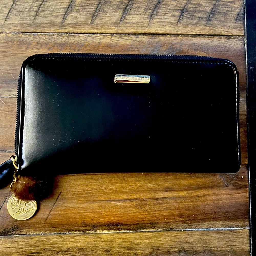 Brand-new black Italian leather Baci & Abbracci purse, comes with box.